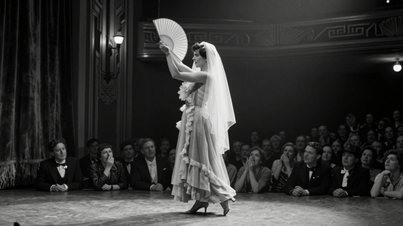 1920s vaudeville dancer performing a theatrical strip with a fan on stage.